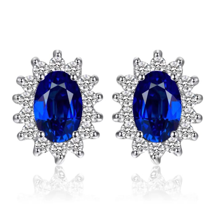 MDS210120 Oval Blue Nano Sapphire Stud Earrings in 0.925 White Sterling Silver